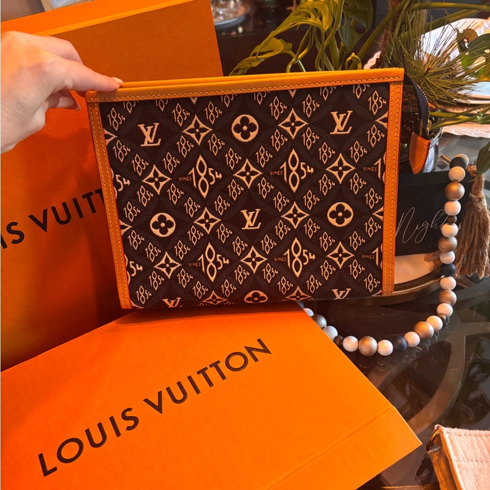 Louis Vuitton
Louis Vuitton Toiletry Blue Since 1854 Canvas Pouch